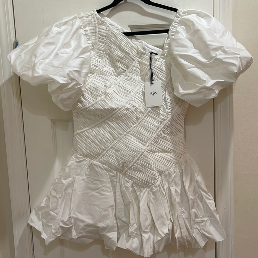 Aje. NEW with Tags Ivory/White Dress. Draw sting Mini Dress. Size 16.